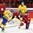 HELSINKI, FINLAND - DECEMBER 26: Sweden's Alexander Nylander #19 gets a shot off on Switzerland's Gauthier Descloux #29 with pressure from Noah Rod #26 during preliminary round action at the 2016 IIHF World Junior Championship. (Photo by Matt Zambonin/HHOF-IIHF Images)



